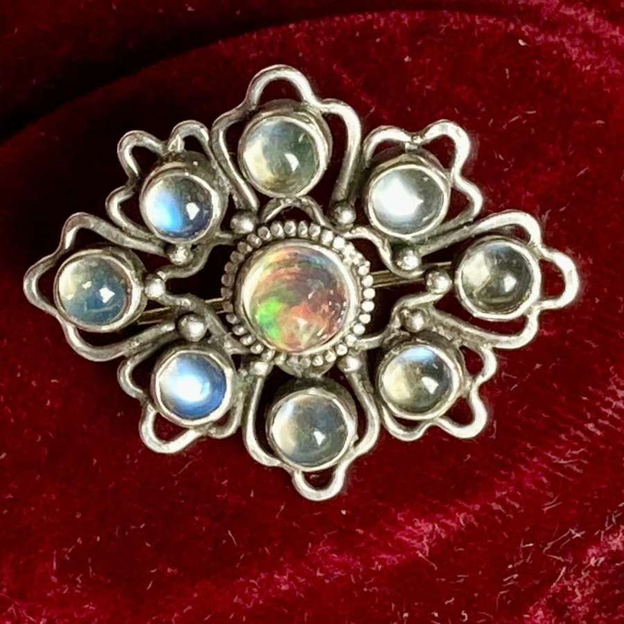 A Liberty & Co opal, moonstone and silver brooch