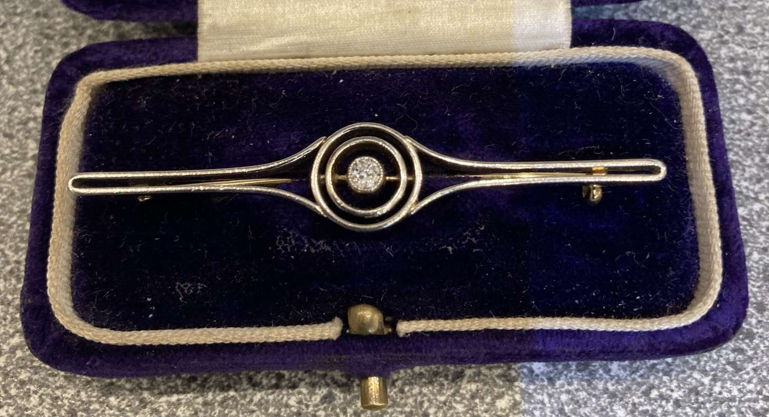 An Art Deco diamond 18ct and platinum brooch