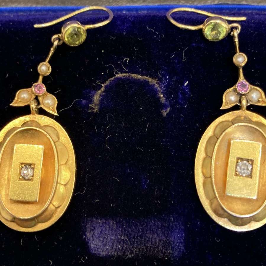 A pair of Suffragist diamond, tourmaline, peridot earrings