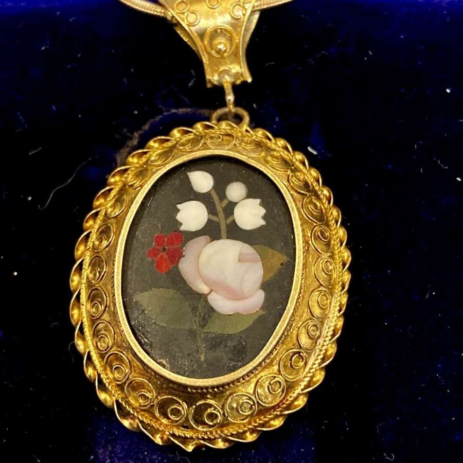 An Italian pietra dura  and gold pendant on sympathetic 18 ct chain